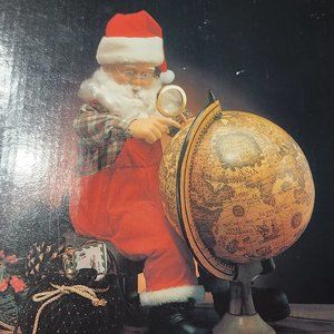 Vintage Santa and his globe